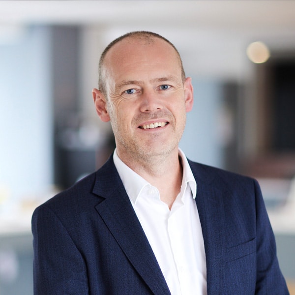 A headshot of Chris Barton