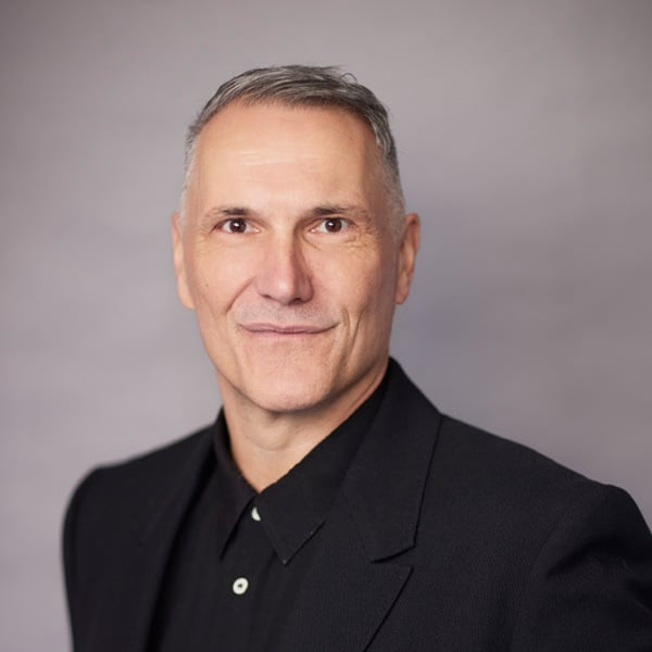 A headshot of Jez Bell