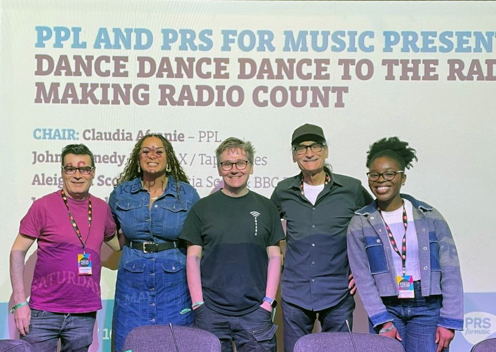 PPL and PRS for Music panel at Focus Wales 2025. Left to right: L-R: John Hywel Morris (PRS for Music), Aleighcia Scott (artist & BBC Radio Wales), John Kennedy (Radio X/Tape Notes), Kevin Cole (KEXP, USA), Claudia Afranie (PPL).