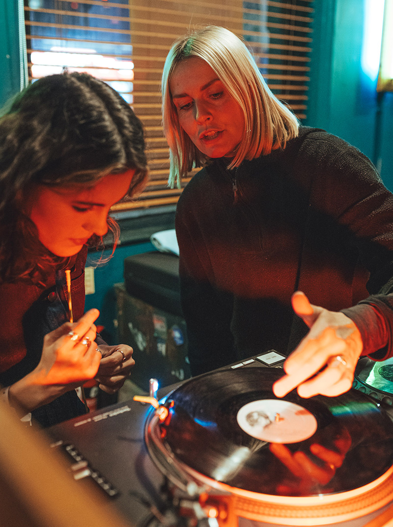 Student and mentor at Saffron's intermediate DJ course.